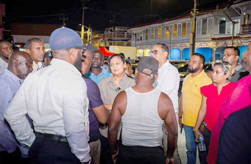 Minister of Local Government and Regional Development, Priya Manickchand, along with Georgetown Mayor Alfred Mentore, councillors, and officials from the Ministry, engage vendors and residents during the ‘Going Forward’ meeting