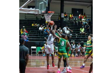 Action in the Inter Guiana Games Basketball segment