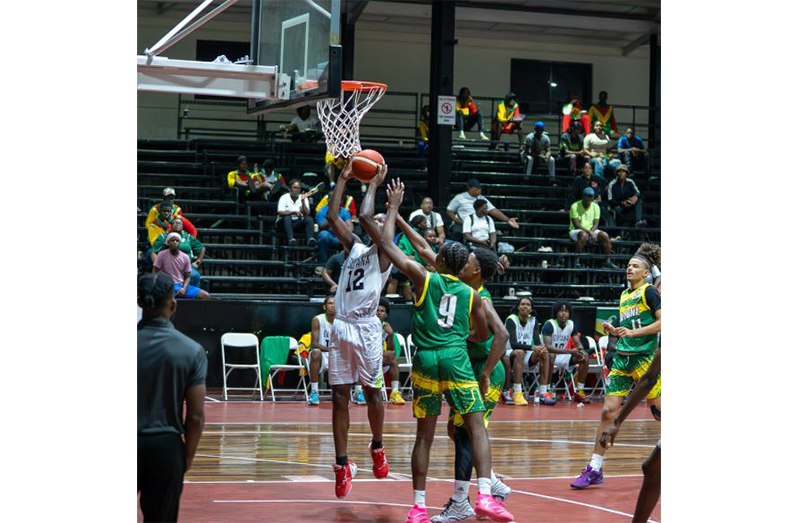 Action in the Inter Guiana Games Basketball segment