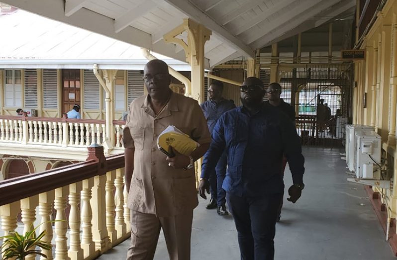 Chief Elections Officer Keith Lowenfield on his way to the Courtroom on Friday