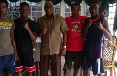 The three-man St Lucian team with GBA president Steve Ninvalle