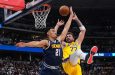 Luka Doncic is fouled by Denver Nuggets forward, Spencer Jones, in the first half