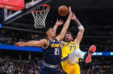 Luka Doncic is fouled by Denver Nuggets forward, Spencer Jones, in the first half