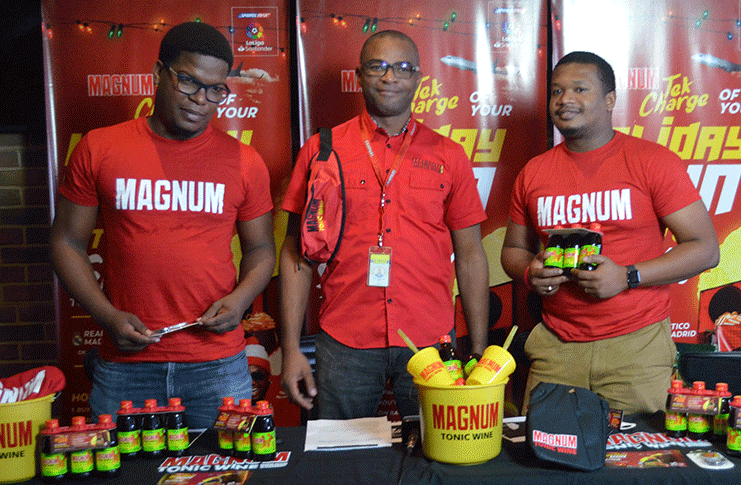 Acting Brand Manager for Magnum Tonic Wine; Rayan Lutchman (middle), Corporate Communications Officer; Treiston Joseph (left) and TMA Supervisor; Yannick Jordan (right)