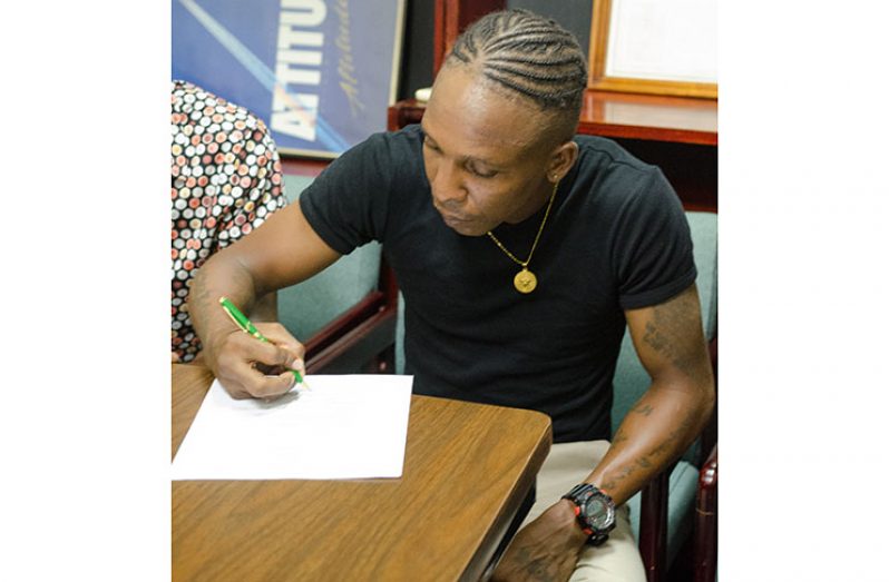 Dexter Marques sings his contract for the September 28 flyweight clash against Colombian Jose Antonio Jimenez at Durban Park.  