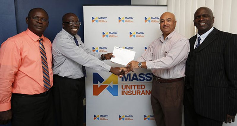 L-R Branch Manager Lindel Harlequin gives sponsorship cheque to Golf Club president Oncar Ramroop, flanked by Vibert Austin, and Club PRO, Guy Griffith.