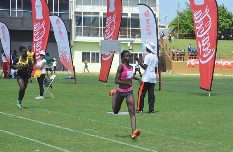 District 11’s Claudrice McKoy finishes the Girls’ U-18 1500m in record-breaking time