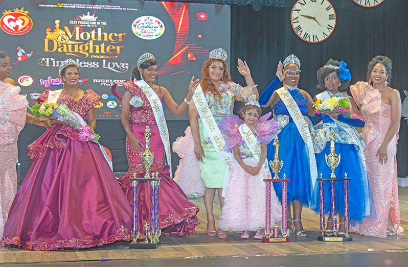 (From left) Pageant founder Mrs. Ingrid Fung; Senior Category first place winners Govita Henry and Eleesha; Junior Category first place winners Hayma Singh and Madeline; Vanessa Bowman and Izegbuwa, the first place winners in the Middle Category and the pageant’s co-producer Dr. Sulan Fung (Japheth Savory photo)