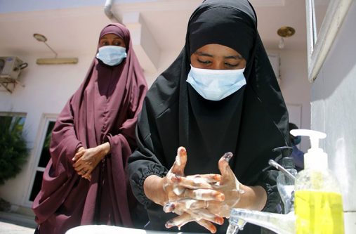 Somali women wash their hands during coronavirus awareness training conducted by the local paramedics and doctors in Somali capital Mogadishu, on Thursday, March, 19, 2020 (AP Photo/Farah Abdi Warsameh)