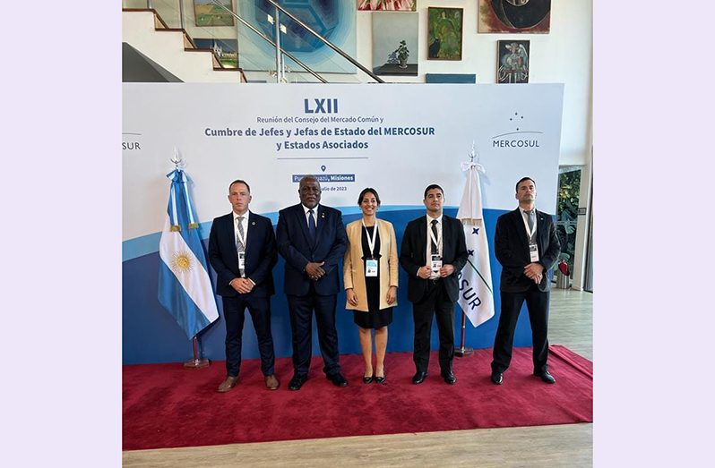 Prime Minister, Brigadier (Ret’d), Mark Phillips flanked by other officials at the 62nd Summit of Heads of State of MERCOSUR and Associated States, which was held in Puerto Iguazu, Misiones Province, Argentina, on Tuesday