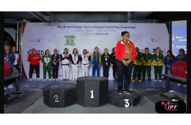 Taharally on the podium at the IPF Masters Championship