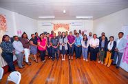 Human Services Minister Dr. Vindhya Persaud  and staff undergoing training on the GSSS digital platform