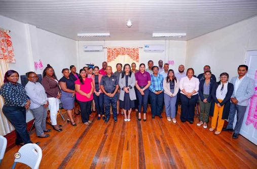Human Services Minister Dr. Vindhya Persaud  and staff undergoing training on the GSSS digital platform