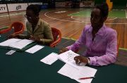Minister of Education, Nicolette Henry (left) and Deputy Director of Sport Melissa Dow-Richardson at yesterday’s consultation