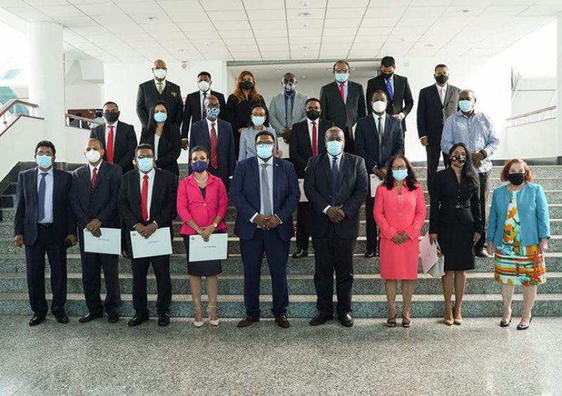 President Irfaan Ali (centre) stands along with the 19 newly appointed Ministers of Cabinet (MoTP photo)