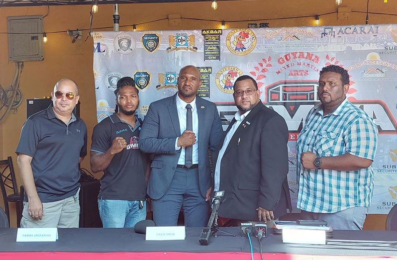Executives of the GYMMAF, along with Pan Am MMA Federation president, Jason Fraser (second from right), following a press conference yesterday.