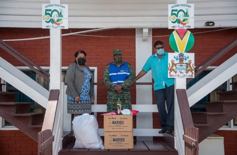 (from left) REO of Region 6, Kim William-Stephen; CDC Senior Response Officer, Captain Salim October and Regional Chairman, David Armogan