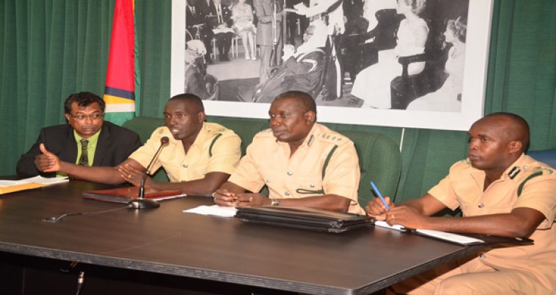 Minister of Public Security, Khemraj Ramjattan is flanked by Officer in charge of the Georgetown Prisons, Senior Superintendent Kevin Pilgrim , Director of Prisons ,Carl Graham and Deputy Director of Prisons, Acting Senior Superintendent Gladwin Samuels at yesterday’s press conference.