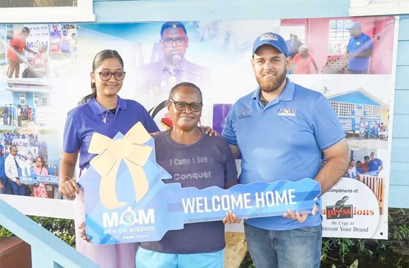 Recipient, Angela Emmanuel and representatives from Men on Mission