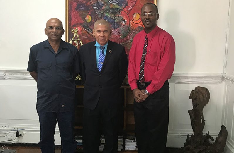 From L-R Fullbore captain Mahendra Persaud stands with Minister of Sport Dr George Norton and GuyanaNRA Honorary Secretary Ryan Sampson.