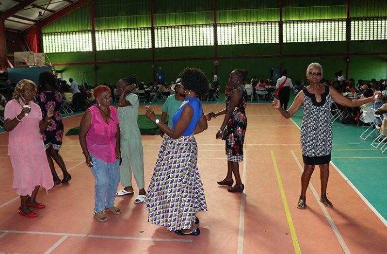 Some of the senior citizens dancing and enjoying their Christmas party