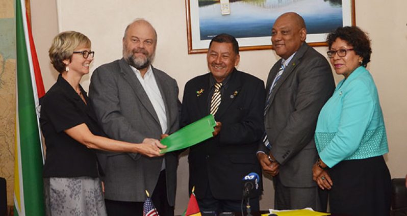 Peace Corps Guyana Director, Linda Arbogast, US Ambassador, Perry Holloway, Minister of Indigenous People’s Affairs, Sydney Allicock, Minister of Natural Resources, Raphael Trotman and Minister within the Ministry of Indigenous People’s Affairs, Valerie Garrido-Lowe are all smiles after the signing of the agreement