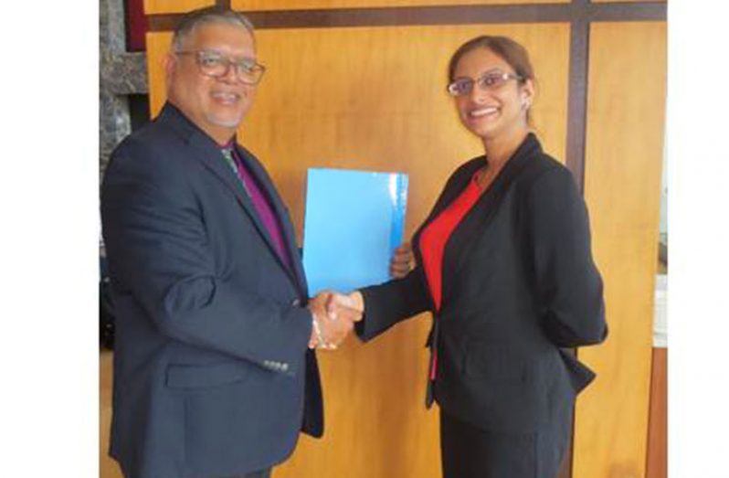 PSC Corporate Coordinator Ramesh Dookhoo and CEO of the Caribbean Corporate Governance Institute, Denise Deonarine
