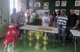 The organisers with Neville Sarjoo photos (background) MVP motor-cycle and trophies (Sean Devers photos)