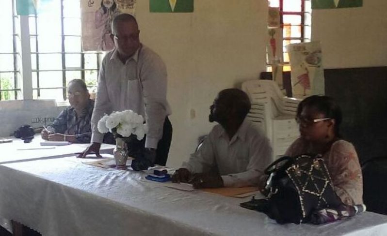 Mabaruma’s first mayor, Henry Smith, (standing) addresses the
council while Deputy Mayor Ashtrilla ‘Trilly’ Gammel (right) and
others look on