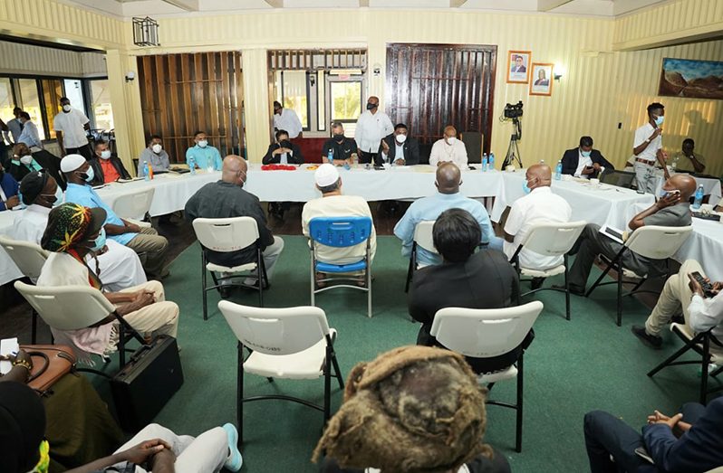 President, Dr. Irfaan Ali and other government officials engaging residents of Region 10 on Thursday (Office of the President photo)