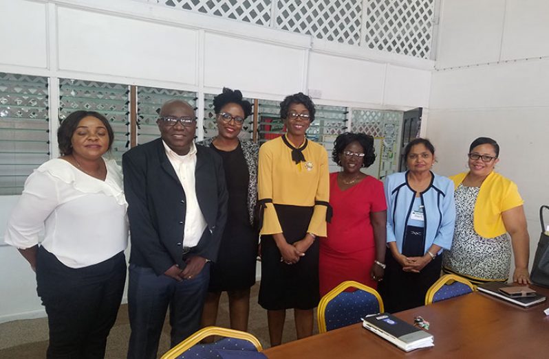 Chief Education Officer Marcel Hutson (second left) with other ministry officials and representatives of Mae’s Schools on Tuesday