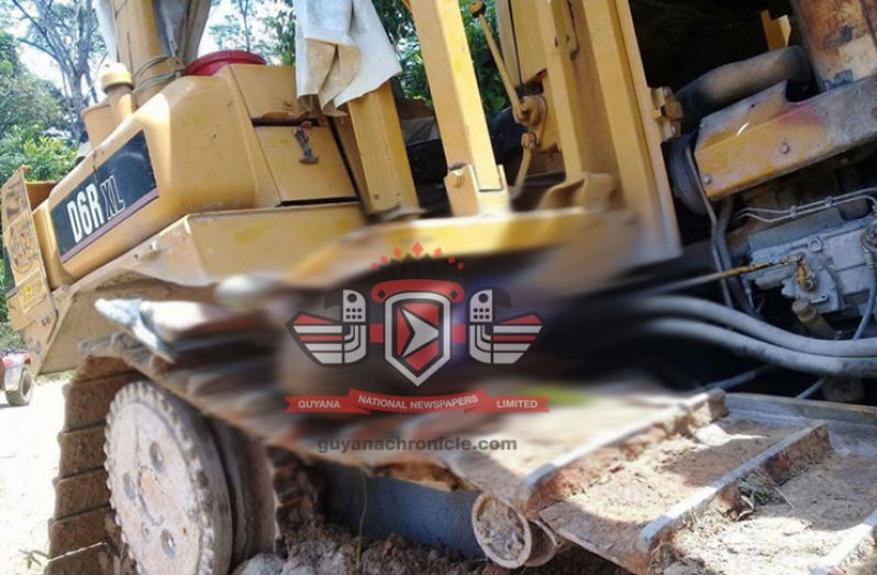 The excavator under which the man met his demise .
