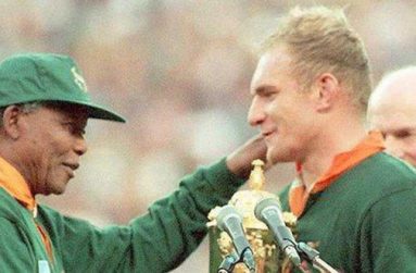 South Africa hosted the Rugby World Cup in 1995, with Francois Pienaar receiving the trophy from Nelson Mandela.