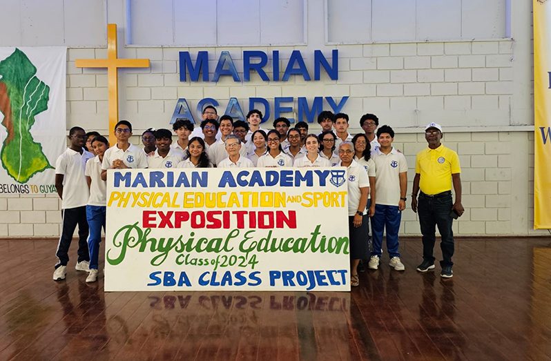 Students and teachers of Marian Academy during the CSEC exposition