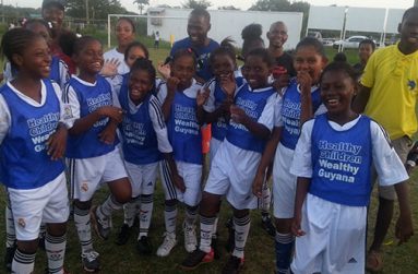 With the stereo sounds blasting in the background the tune ‘We are the champions’, the victorious Stella Maris Girls Under-11 Pee Wee championship-winning team find it hard to contain their exuberance as they sing along to celebrate their win.