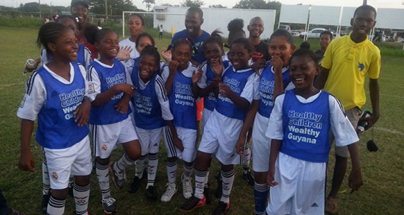 With the stereo sounds blasting in the background the tune ‘We are the champions’, the victorious Stella Maris Girls Under-11 Pee Wee championship-winning team find it hard to contain their exuberance as they sing along to celebrate their win.