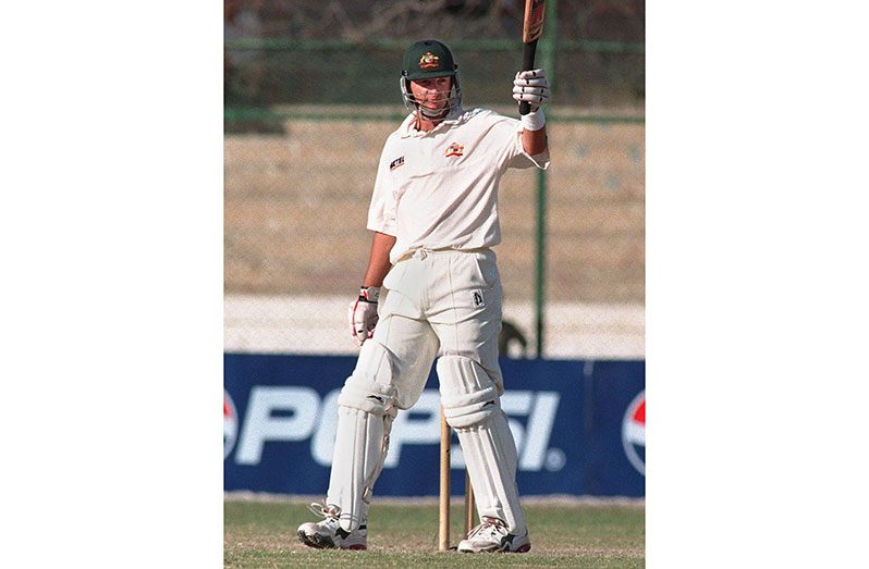 Mark Waugh celebrates his century in Karachi (Getty)