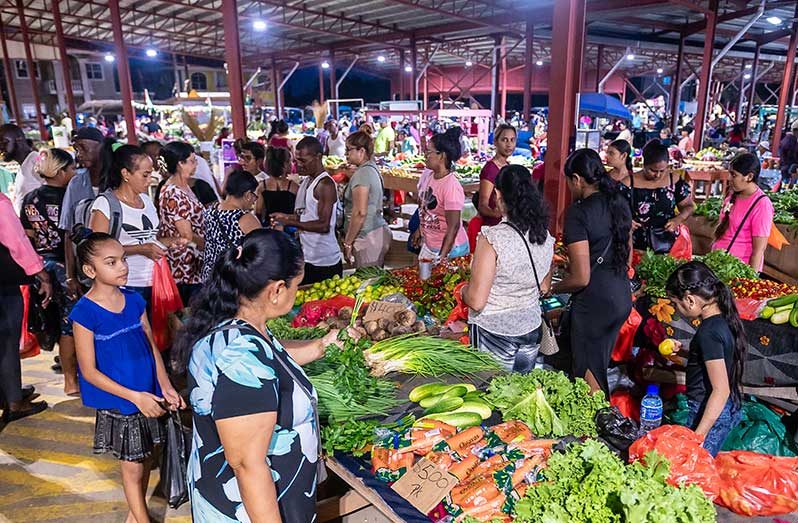 Crowded Friday night shoppers take advantage of great deals at Leonora Market