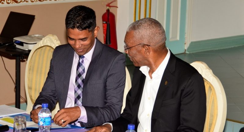 President David Granger (right) and President of the Guyana Press Association, Neil Marks. [Adrian Narine photo]
