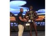 GBBFF 2025 National Novice Champion Marley Vyphius collecting the Novice trophy from Zoon CEO Dave Savoury
