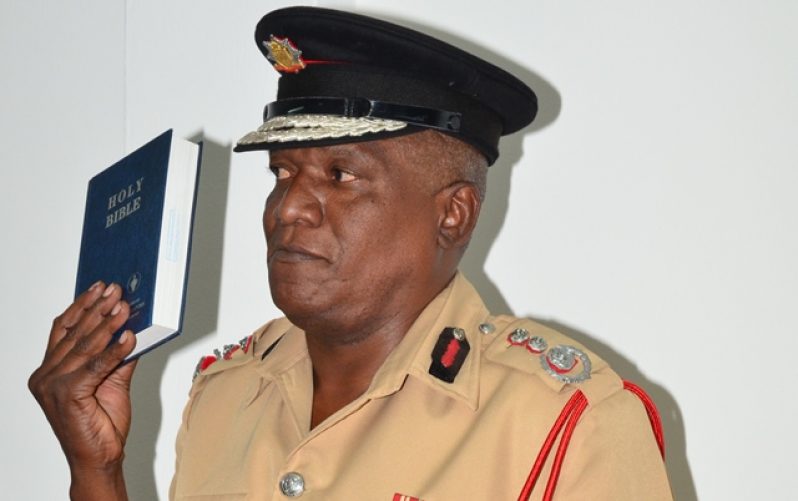 Fire Chief Marlon Gentle takes the oath on Thursday before giving his testimony before the CoI