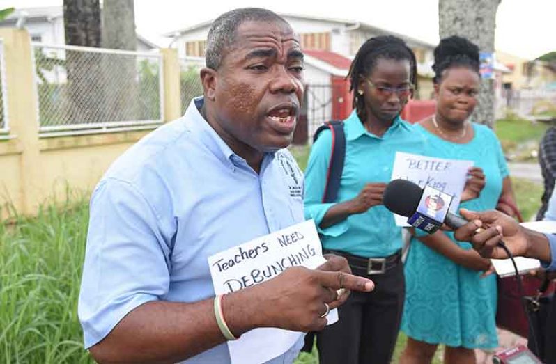 Chairman of the South Georgetown Branch, Kerwin Mars, speaking on behalf of the South Georgetown teachers (Samuel Maughn photo)