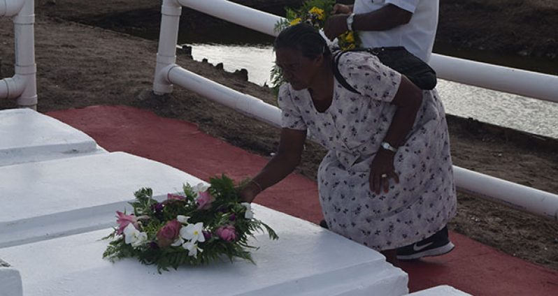 A relative of one of the Enmore Martyrs lay a wreath at Le Repentir cemetery Wednesday morning