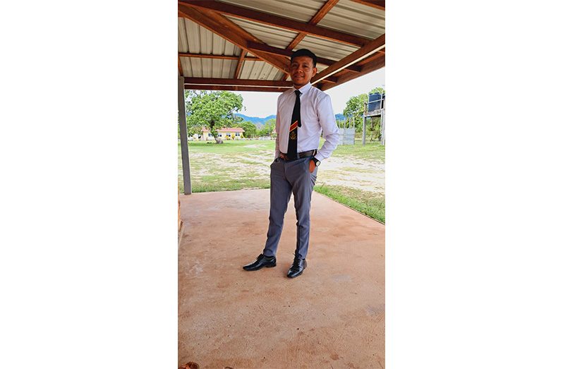 Ravis Bartholemew, lifelong Massara resident and teacher, at the village’s first secondary school