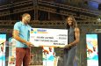 Massy Stores awarded Julien Alfred $30,000 during the celebratory concert at the Daren Sammy Cricket Ground on Friday last