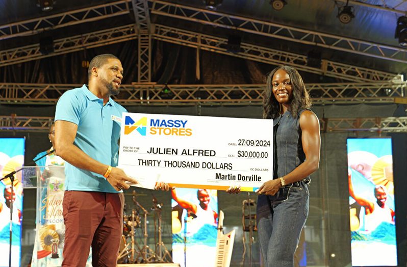 Massy Stores awarded Julien Alfred $30,000 during the celebratory concert at the Daren Sammy Cricket Ground on Friday last