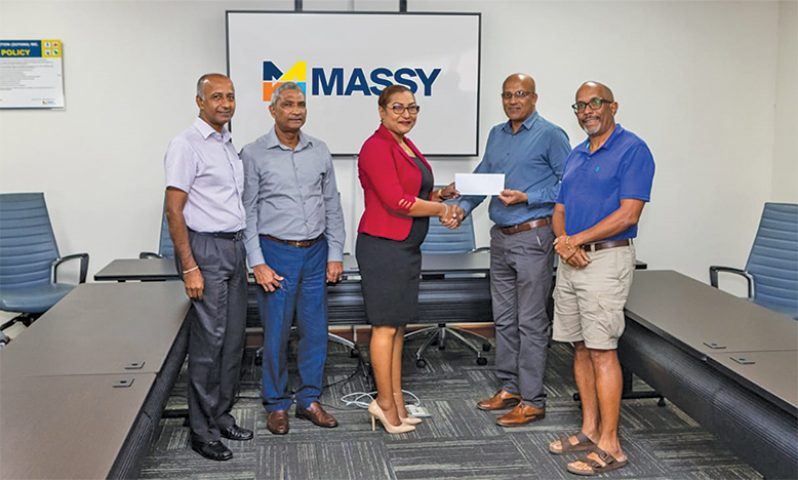 From left, Massy executives Lekhnaraine Shivraj, Navindra Thakur and ShaliniThakur-Jagdeo handed over a cheque to Lusignan Golf Club officials, Patanjilee Persaud and Chet Bowling, to help sponsor the club’s 18-hole one-day golf tournament.