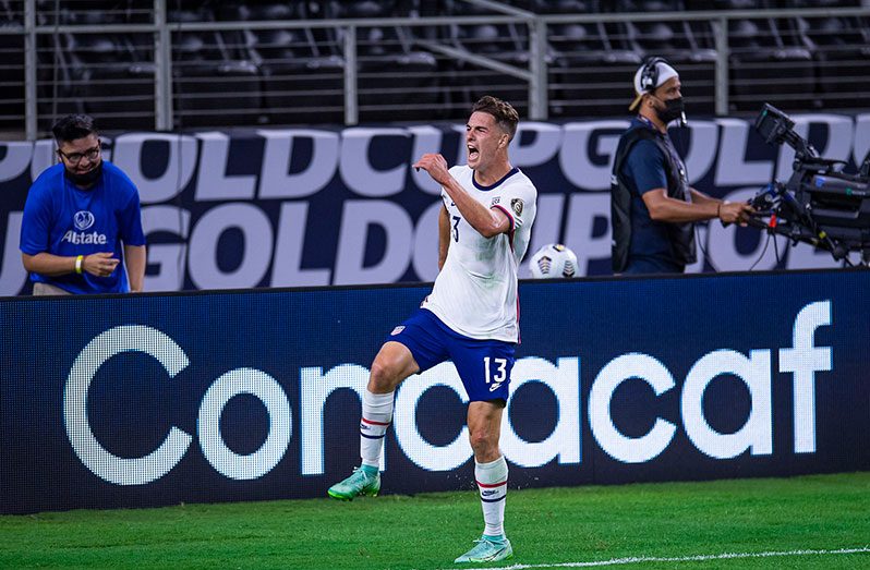 Matthew Hoppe of Team USA celebrates after scoring the game-winner during the Concacaf Quarter final between Jamaica and USA on Sunday night in Arlington Texas.