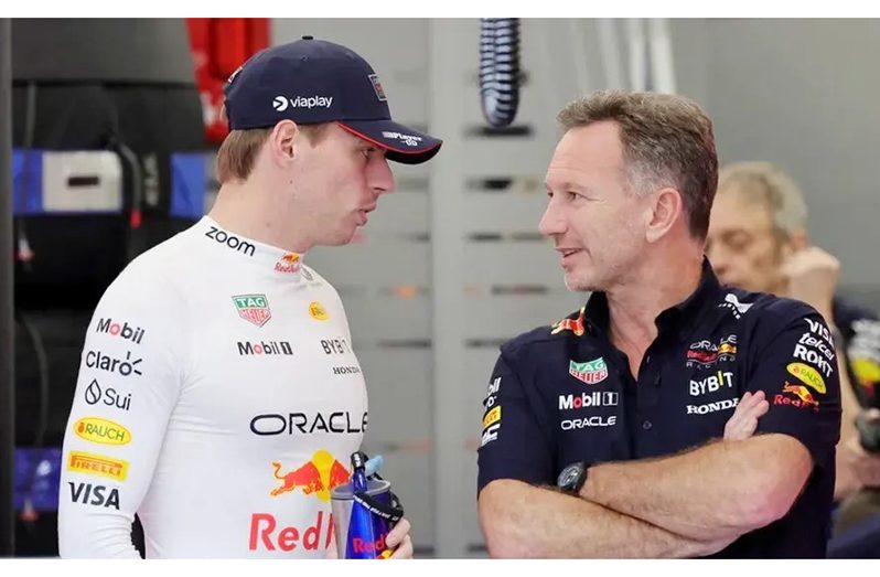 Red Bull team principal Christian Horner, right, with F1 world champion Max Verstappen