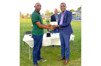 City Mayor Alfred Mentore hands over the sponsorship cheque to GCA’s Shawn Massiah